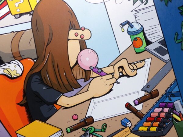 Zoom sur le personnage principal de la toile et sur sa planche de BD.