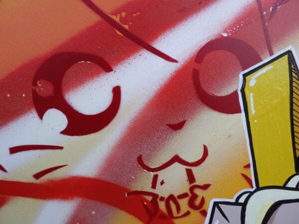 Gros plan sur le visage du petit hamster qui grignote sa gaine de tournesol. On voit ici que Marcel Champion a joué sur le coté abîmé du panneau pour en faire un objet qui a vécu. Il y a ajouté des éclats de peinture pour renforcer cet aspect.