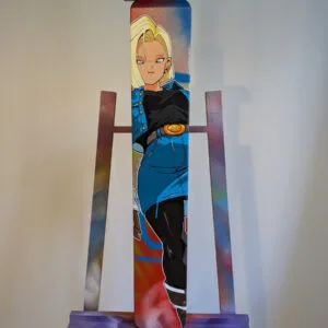 Vue de face de la toile de C18. Le panneau est placé sur un chevalet d'atelier. Avec cette vue on se rend compte du format très spécial de ce support.