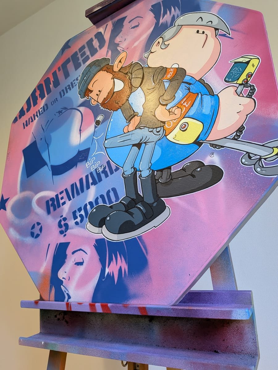 Sur cette vue en contre plongée du panneau dédié à Lapince et Domino; on peut apprécier le mélange des couleurs de fond. Des nuances de bleu et de rose qui se mélange avec quelques traits de blanc pour structurer le tout.