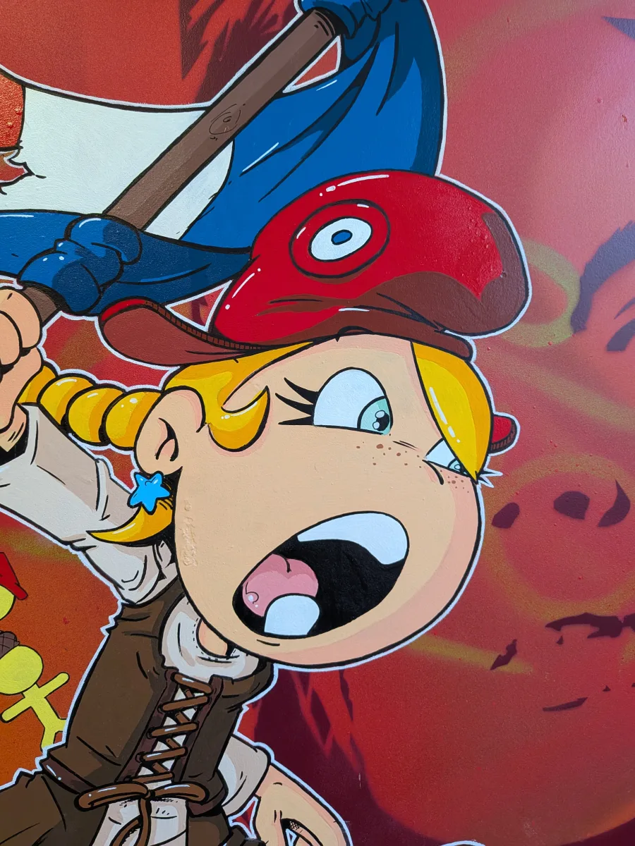 Gros plan saisissant sur Thérébentine, l’héroïne rebelle de la cultissime BD franco-belge, dans une peinture street-art explosive réalisée sur panneau de signalisation routière. Bonnet phrygien rouge orné d’une cocarde tricolore, couettes blondes au vent, regard fou et bouche grande ouverte dans un cri de révolte : elle incarne une Marianne version BD enragée, reprenant à son compte l’énergie de « La Liberté guidant le peuple » de Delacroix. Détails pop et graffiti puissants, couleurs saturées et expression ultra-dynamique pour cette œuvre unique mêlant bande dessinée, révolution française et art urbain contemporain. Thérébentine gros plan, Thérébentine bonnet phrygien, street art Thérébentine sur panneau routier, Marianne version BD, Delacroix revisité BD franco-belge, art urbain révolutionnaire 2025